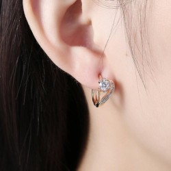 Heart shaped gold earrings - with white zirconia